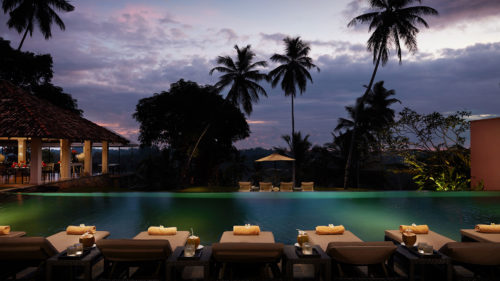 Poolside view at sunset at Kahanda Kanda hotel