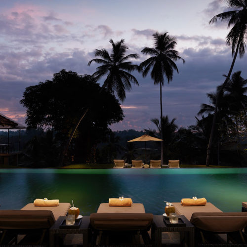 Poolside view at sunset at Kahanda Kanda hotel