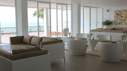 Indoor area with sea view at the Michelle Boutique