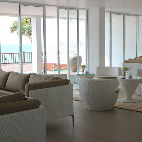 Indoor area with sea view at the Michelle Boutique