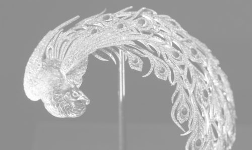 greyscale image of peacock_badge