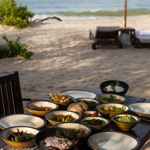 A table full of food at Jungle Beach hotel