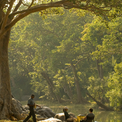 taj-banjaar-tola-couple-sitting-on-deck-chairs