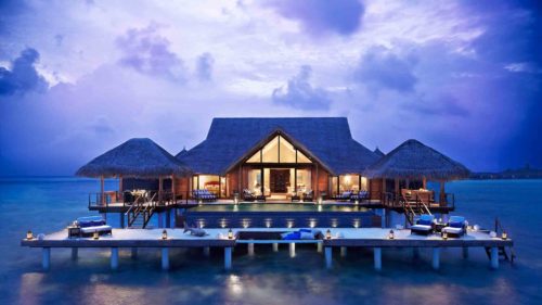 taj-exotica-resort-spa-view-of-the-hotel-on-stilits-in-the-water