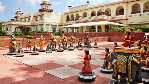 large chess pieces outside jai mahal