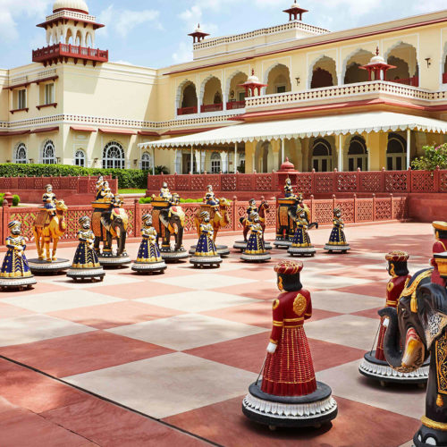 large chess pieces outside jai mahal