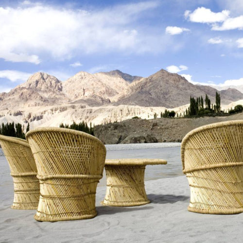chairs facing mountains