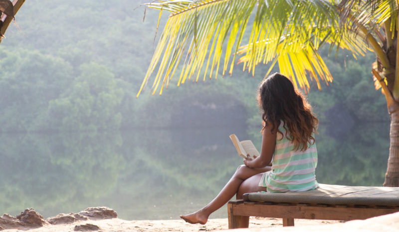 Discover Goa | Reading under palms