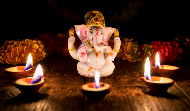 Temple Etiquette | Ganesha and candles