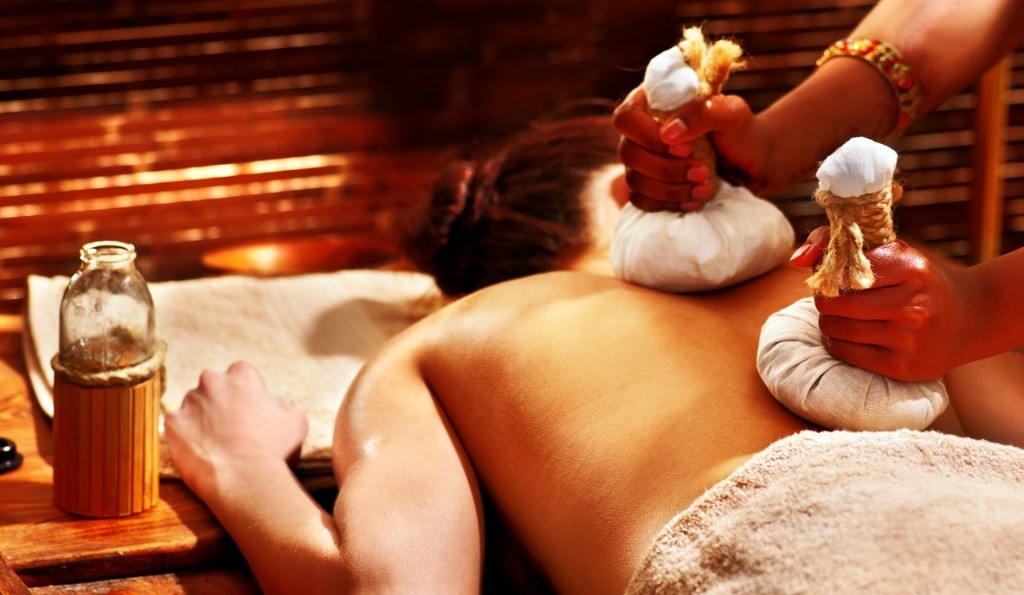 Best Ayurvedic Massage in London | woman-having-massage-with-pouch-picture-id491683745