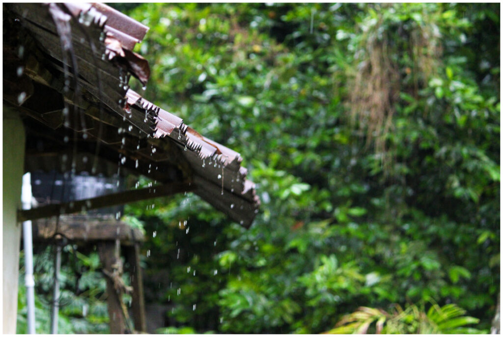 Rain water dropping from old building, a scene in Monsoon from Kerala, India